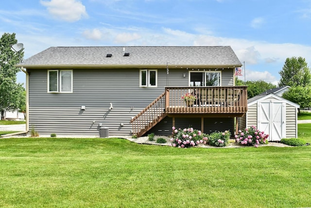 404 3rd Way SE, Dover, MN 55929 - back of house featuring a storage shed, a deck, a yard, and roof with shingles