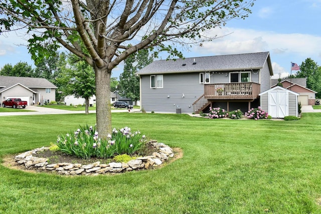 404 3rd Way SE, Dover, MN 55929 - rear view of property with a storage unit, a wooden deck, stairs, and a yard
