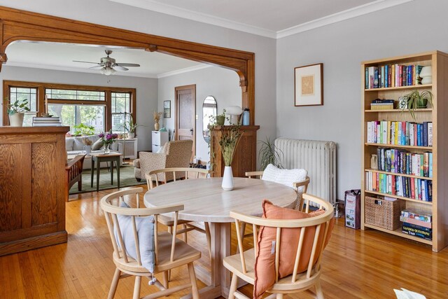 5000 Newton Ave S, Minneapolis, MN 55419 - dining space with light wood-type flooring, ornamental molding, ceiling fan, and radiator
