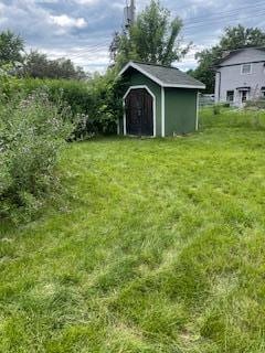 2243 Edgebrook Ave, Saint Paul, MN 55119 - view of green lawn with a storage unit