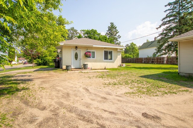 724 10th St NW, Bemidji, MN 56601 - bungalow-style house with stucco siding