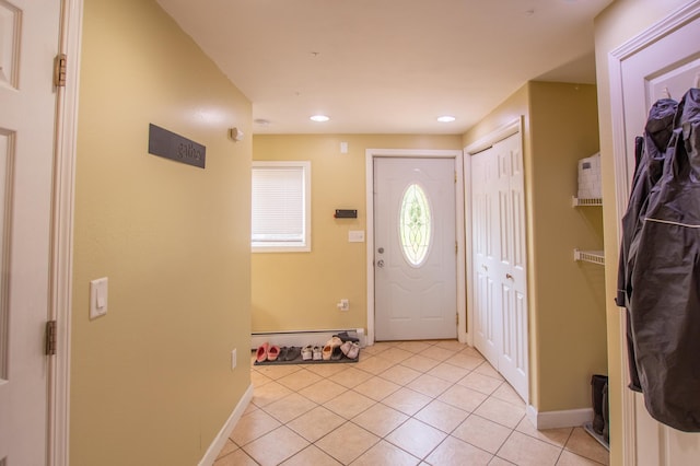 724 10th St NW, Bemidji, MN 56601 - foyer featuring light tile patterned floors, a baseboard heating unit, and recessed lighting
