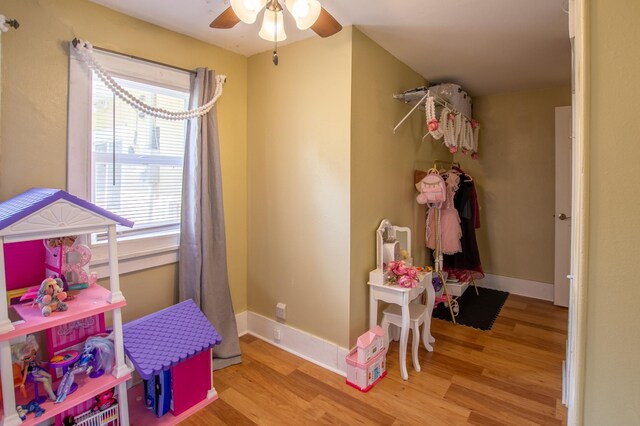 724 10th St NW, Bemidji, MN 56601 - game room with wood finished floors and a ceiling fan