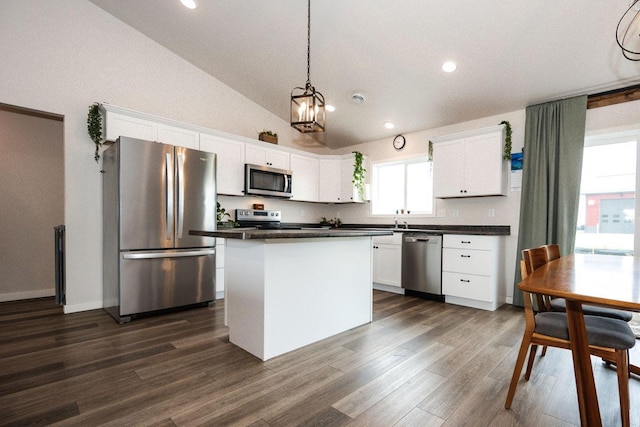 713 Prairie Wind Ave, Callaway, MN 56521 - kitchen with stainless steel appliances, dark countertops, dark wood finished floors, white cabinets, and lofted ceiling