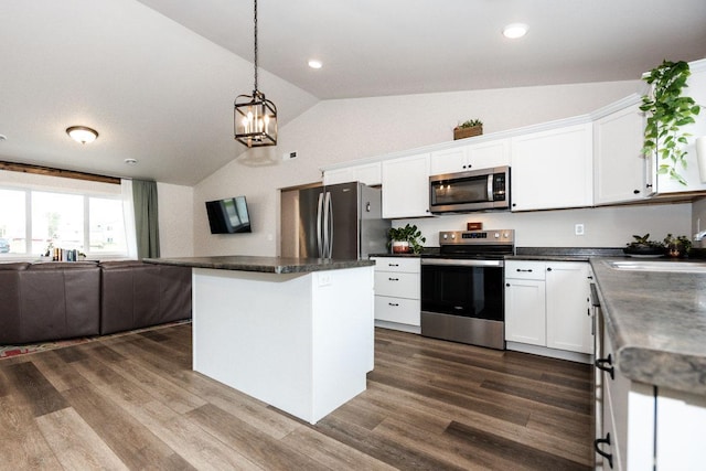 713 Prairie Wind Ave, Callaway, MN 56521 - kitchen with appliances with stainless steel finishes, open floor plan, white cabinets, a chandelier, and dark countertops