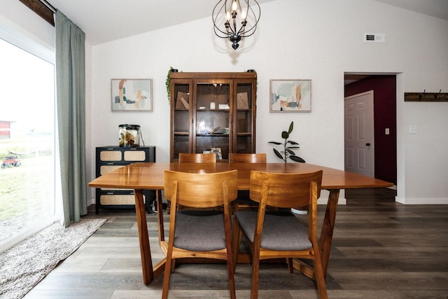 713 Prairie Wind Ave, Callaway, MN 56521 - dining room with lofted ceiling, wood finished floors, and a chandelier
