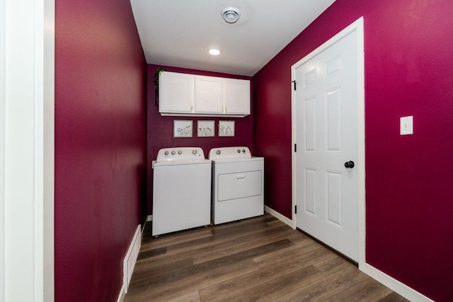 713 Prairie Wind Ave, Callaway, MN 56521 - laundry room with cabinet space, washer and clothes dryer, dark wood-style flooring, and recessed lighting