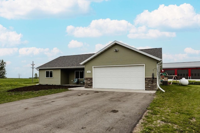 713 Prairie Wind Ave, Callaway, MN 56521 - ranch-style house featuring driveway, an attached garage, a front lawn, and roof with shingles