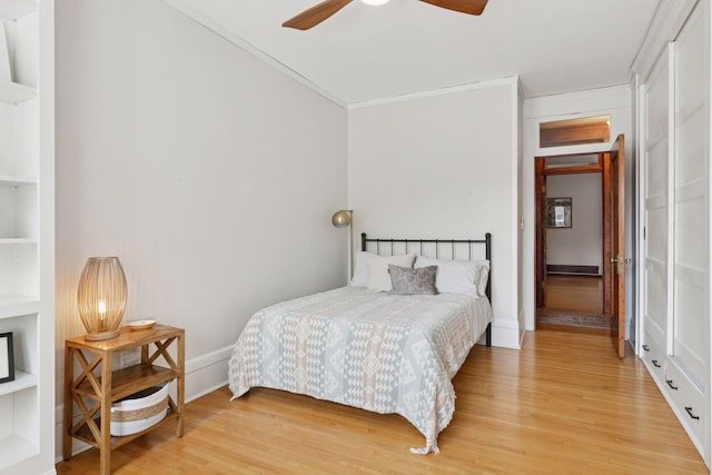 436 Holly Ave Unit 3, Saint Paul, MN 55102 - bedroom featuring light wood-style flooring, crown molding, and a ceiling fan