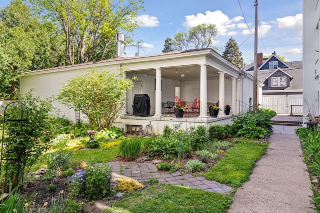 436 Holly Ave Unit 3, Saint Paul, MN 55102 - view of front of home featuring stucco siding and a patio area