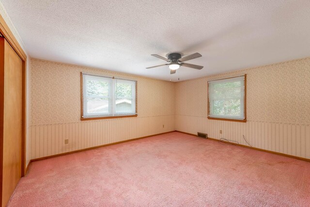 419 Jackson St, Saint Peter, MN 56082 - carpeted spare room with ceiling fan and a textured ceiling