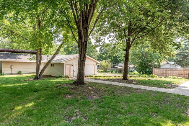419 Jackson St, Saint Peter, MN 56082 - view of yard with an attached garage