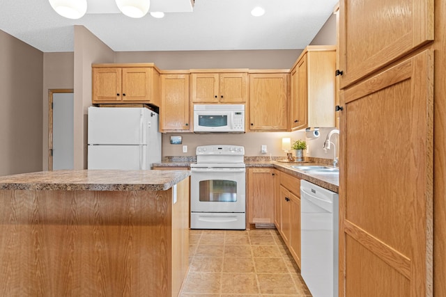 3010 Hazelwood St, Maplewood, MN 55109 - kitchen with white appliances, light brown cabinetry, light countertops, and light tile patterned floors