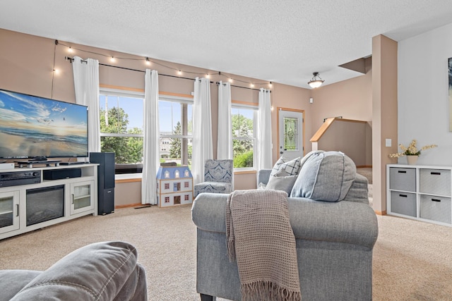 3010 Hazelwood St, Maplewood, MN 55109 - carpeted living room with a textured ceiling
