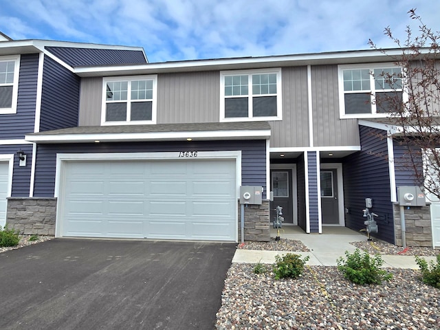 13636 Kaylemore Trl, Rosemount, MN 55068 - multi unit property featuring stone siding, a garage, and driveway