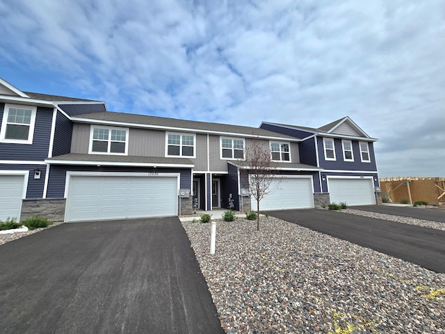 13636 Kaylemore Trl, Rosemount, MN 55068 - multi unit property with driveway, an attached garage, and stone siding