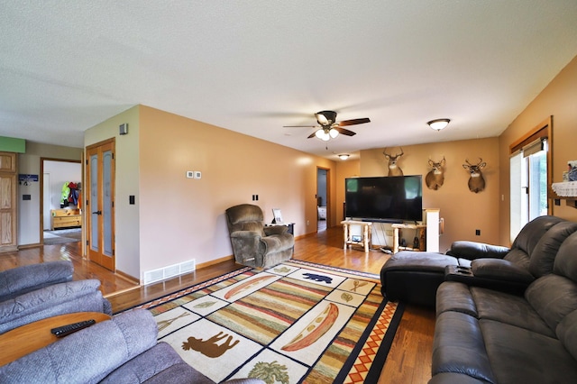 39808 340th Ln, Aitkin, MN 56431 - living area featuring wood finished floors and ceiling fan
