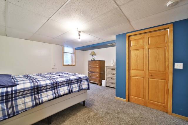 39808 340th Ln, Aitkin, MN 56431 - carpeted bedroom with a paneled ceiling and rail lighting