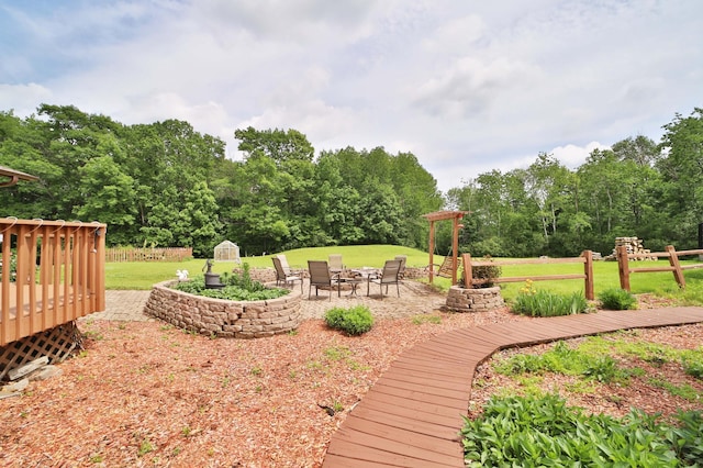 39808 340th Ln, Aitkin, MN 56431 - view of green lawn with a wooden deck