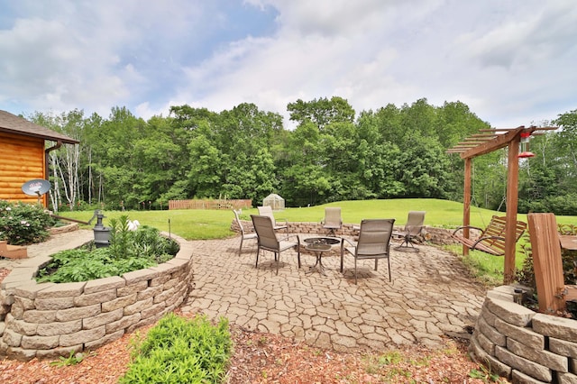 39808 340th Ln, Aitkin, MN 56431 - view of patio with an outdoor fire pit