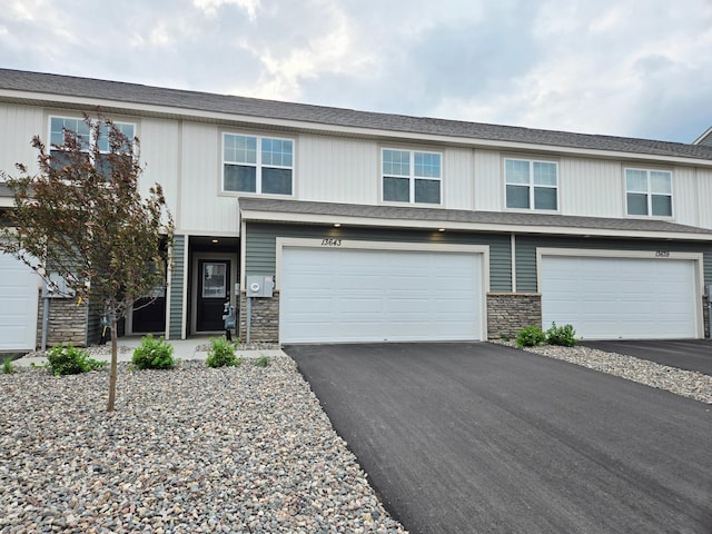 13643 Kaylemore Trl, Rosemount, MN 55068 - multi unit property with stone siding, driveway, and an attached garage