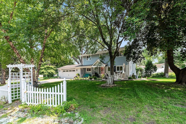 2068 Thorndale Ave, New Brighton, MN 55112 - view of front of home featuring a garage, driveway, and a porch