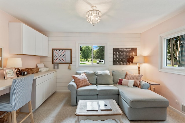 2068 Thorndale Ave, New Brighton, MN 55112 - living area with a chandelier and light carpet