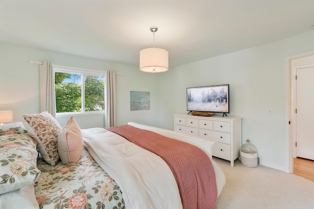 2068 Thorndale Ave, New Brighton, MN 55112 - bedroom featuring light carpet and baseboards