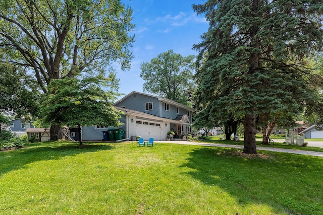 2068 Thorndale Ave, New Brighton, MN 55112 - view of front of home with driveway, a front yard, and a garage
