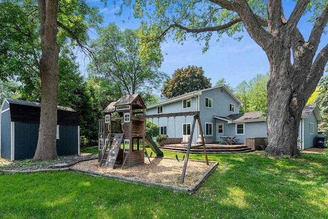 2068 Thorndale Ave, New Brighton, MN 55112 - back of property with a storage shed, a yard, a deck, and a playground