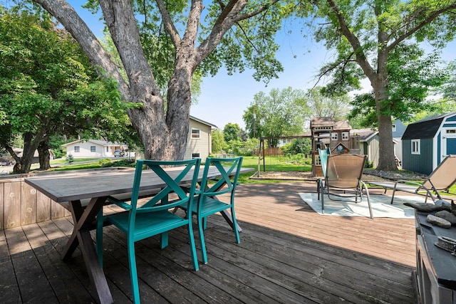 2068 Thorndale Ave, New Brighton, MN 55112 - deck with a playground and a storage unit