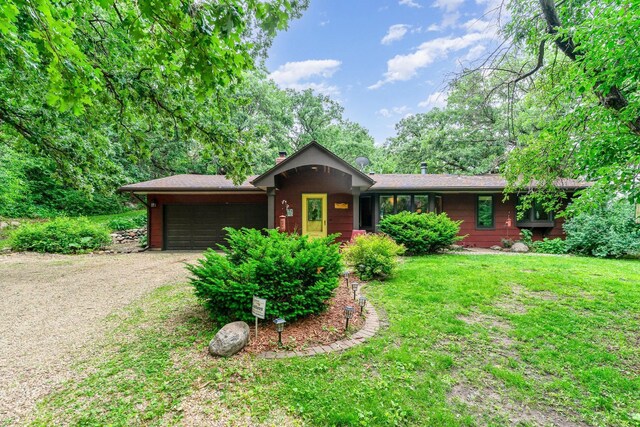 1350 Crestridge Ln, Eagan, MN 55123 - ranch-style home featuring a garage, dirt driveway, a front yard, and a chimney