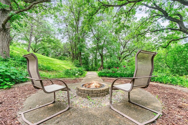 1350 Crestridge Ln, Eagan, MN 55123 - view of patio / terrace featuring an outdoor fire pit