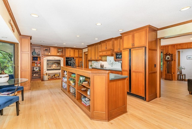 1350 Crestridge Ln, Eagan, MN 55123 - kitchen featuring black appliances, open shelves, light wood-style floors, crown molding, and recessed lighting