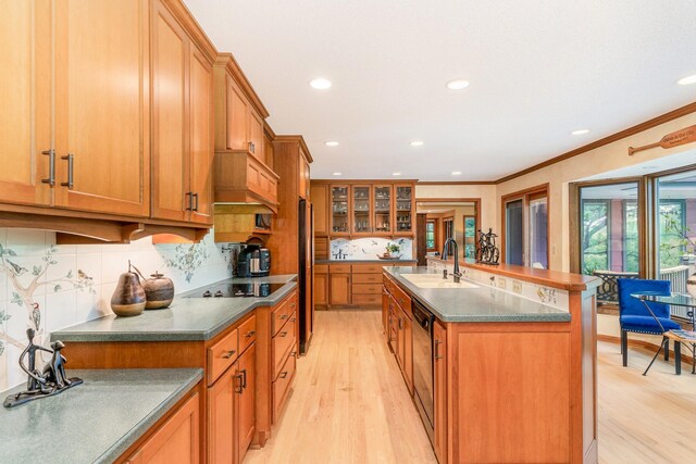 1350 Crestridge Ln, Eagan, MN 55123 - kitchen featuring light wood-style flooring, brown cabinets, freestanding refrigerator, recessed lighting, and black electric stovetop