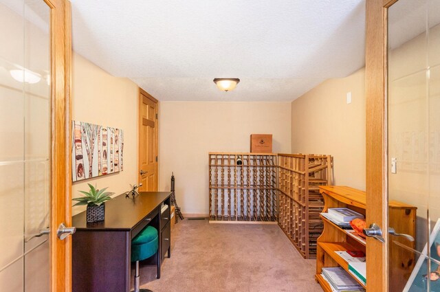 1350 Crestridge Ln, Eagan, MN 55123 - hallway with carpet, a desk, and a textured ceiling