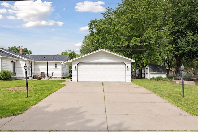 1475 Eldridge Ave E, Maplewood, MN 55109 - ranch-style house with a garage, a front yard, and a storage shed