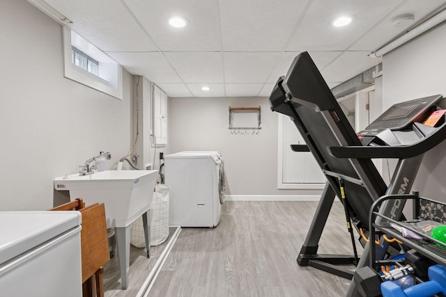 1475 Eldridge Ave E, Maplewood, MN 55109 - workout area with independent washer and dryer, light wood-type flooring, recessed lighting, and a drop ceiling