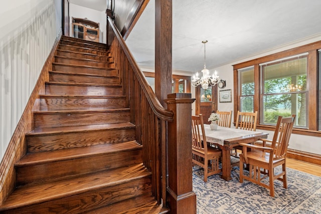 20930 St Francis Blvd NW, Nowthen, MN 55303 - stairs with a chandelier and wood finished floors