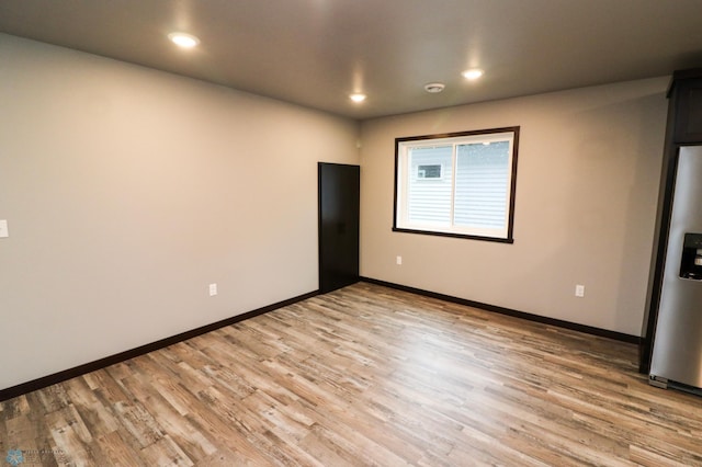 737 2nd Ave, Fargo, ND 58047 - spare room featuring light wood finished floors and recessed lighting