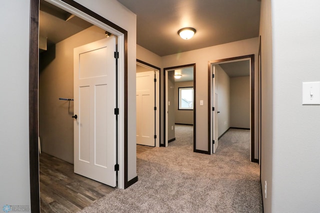 737 2nd Ave, Fargo, ND 58047 - hall with baseboards and carpet floors