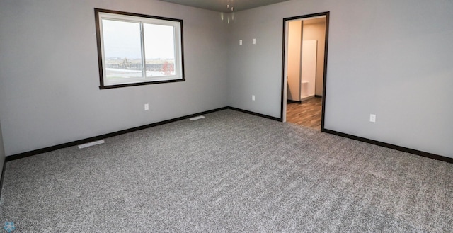 737 2nd Ave, Fargo, ND 58047 - carpeted spare room with baseboards