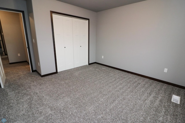 737 2nd Ave, Fargo, ND 58047 - unfurnished bedroom featuring carpet floors and a closet