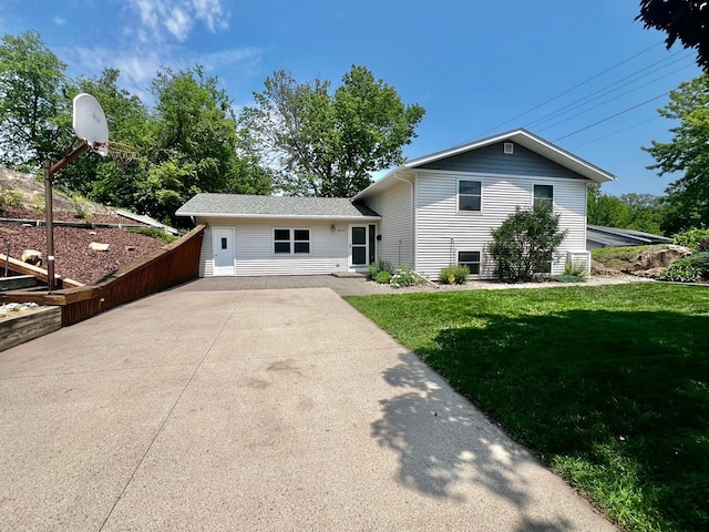 860 11th Ave, Granite Falls, MN 56241 - tri-level home with a front lawn and driveway