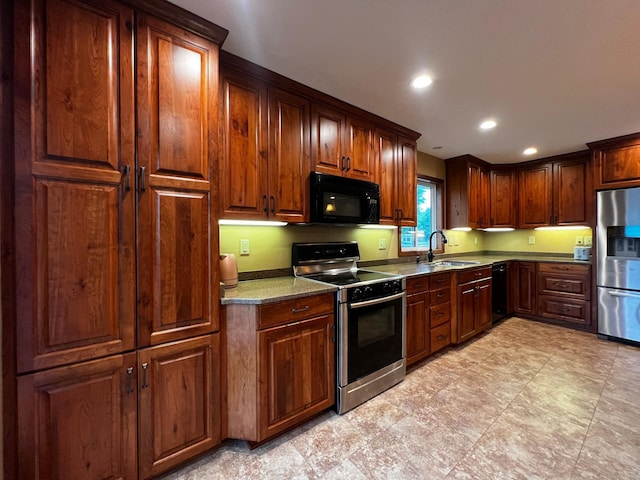 860 11th Ave, Granite Falls, MN 56241 - kitchen featuring black appliances and recessed lighting
