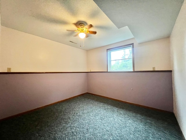 860 11th Ave, Granite Falls, MN 56241 - carpeted spare room featuring a ceiling fan and a textured ceiling