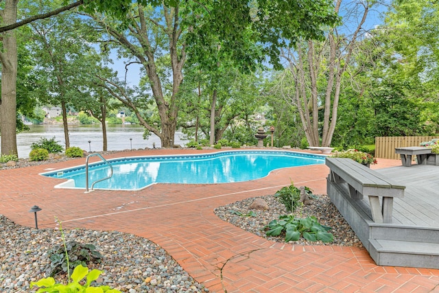 10810 Mississippi Blvd NW, Coon Rapids, MN 55433 - swimming pool featuring a deck with water view, a diving board, and a patio area