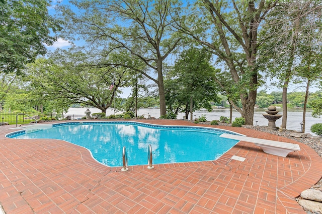 10810 Mississippi Blvd NW, Coon Rapids, MN 55433 - view of pool featuring a diving board and a patio