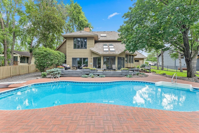 10810 Mississippi Blvd NW, Coon Rapids, MN 55433 - view of swimming pool featuring a fenced backyard, a deck, and a patio