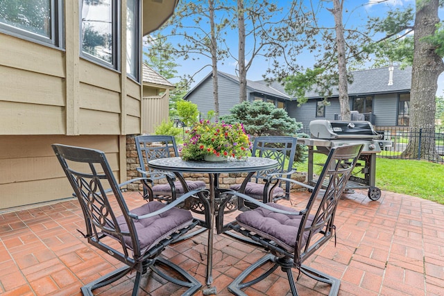 10810 Mississippi Blvd NW, Coon Rapids, MN 55433 - view of patio / terrace featuring area for grilling and outdoor dining space